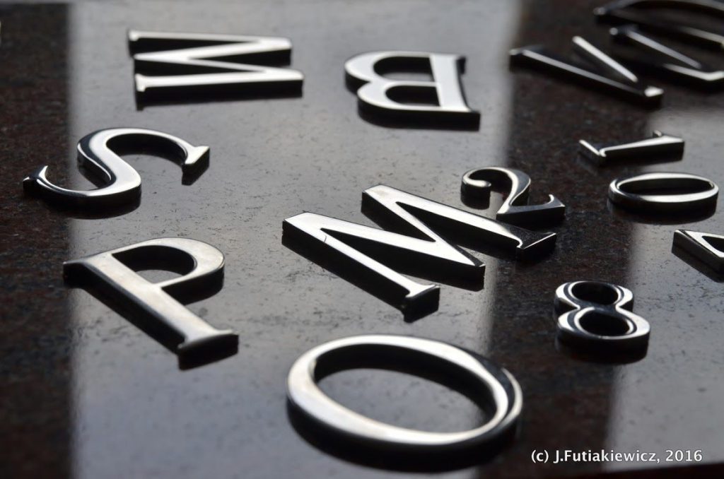 letters on black marble